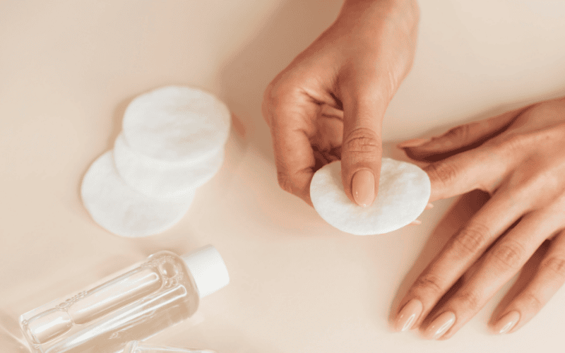 woman preparing to remove acrylic nails without acetone using warm water at home woman preparing to remove acrylic nails without acetone using warm water at home